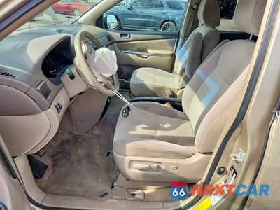 Zdjęcie 7 z 13 samochodu: 2010 TOYOTA SIENNA LE 7-PASSENGER VIN:5TDKK4CC0AS289086 - miniatura