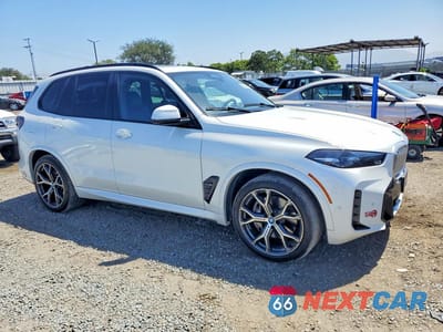 Czwarte zdjęcie samochodu z boku: 2024 BMW X5 XDRIVE50E VIN:5UX43EU0XR9T61291 - miniatura