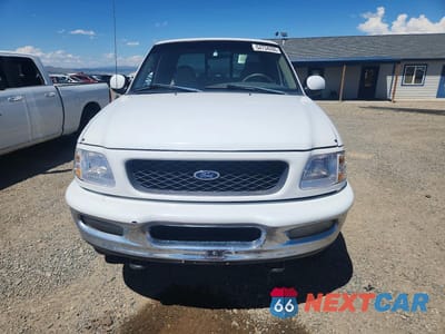 Piąte zdjęcie samochodu w środku: 1998 FORD F150 VIN:1FTRX18L5WKA60330 - miniatura