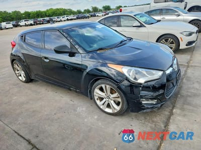 Czwarte zdjęcie samochodu z boku: 2013 HYUNDAI VELOSTER BASE VIN:KMHTC6AD0DU107262 - miniatura