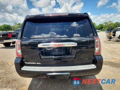 Zdjęcie 6 z 13 samochodu: 2018 GMC YUKON XL DENALI VIN:1GKS1HKJXJR170961 - miniatura