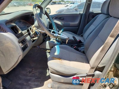 Zdjęcie 7 z 12 samochodu: 2000 CHEVROLET TRACKER VIN:2CNBE13C1Y6912768 - miniatura