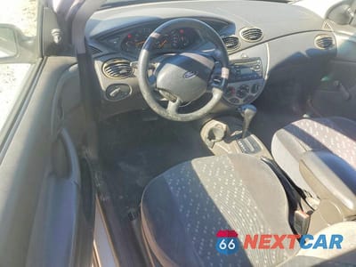 Zdjęcie 8 z 12 samochodu: 2002 FORD FOCUS ZX3 VIN:3FAFP31332R225165 - miniatura
