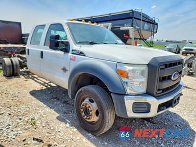 Czwarte zdjęcie samochodu z boku: 2012 FORD F550 SUPER DUTY VIN:1FD0W5HT9CEB10817 - miniatura