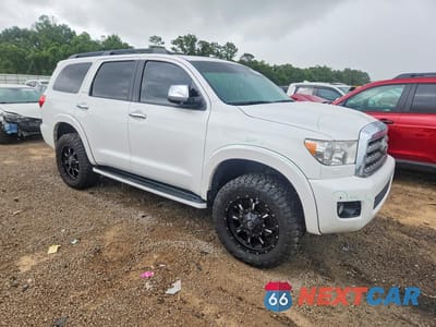 Czwarte zdjęcie samochodu z boku: 2015 TOYOTA SEQUOIA LIMITED VIN:5TDKY5G15FS058320 - miniatura