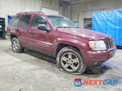 Czwarte zdjęcie samochodu z boku: 2003 JEEP GRAND CHEROKEE LIMITED VIN:1J8GW58NX3C544186 - miniatura