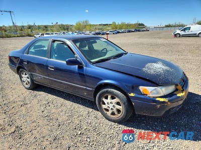 Czwarte zdjęcie samochodu z boku: 1999 TOYOTA CAMRY LE VIN:4T1BF22K0XU931663 - miniatura