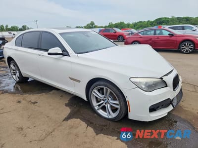 Czwarte zdjęcie samochodu z boku: 2014 BMW 750 LXI VIN:WBAYF8C56ED141806 - miniatura