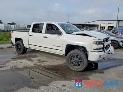 Czwarte zdjęcie samochodu z boku: 2017 CHEVROLET SILVERADO K1500 LTZ VIN:3GCUKSECXHG320573 - miniatura