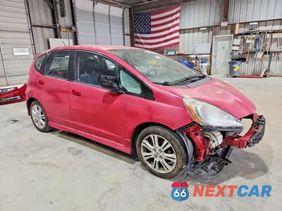 Czwarte zdjęcie samochodu z boku: 2009 HONDA FIT SPORT VIN:JHMGE88479S004388 - miniatura