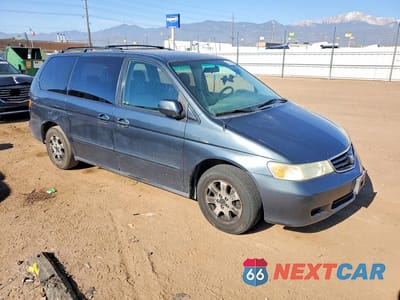 Czwarte zdjęcie samochodu z boku: 2004 HONDA ODYSSEY EX VIN:5FNRL186X4B129738 - miniatura