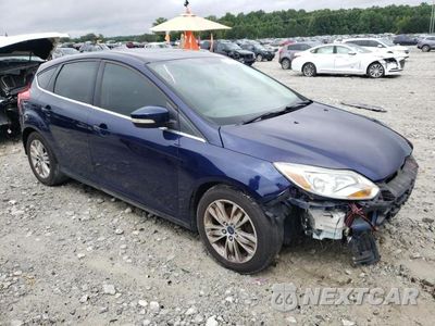 Czwarte zdjęcie samochodu z boku: 2012 FORD FOCUS SEL VIN:1FAHP3M29CL118942 - miniatura
