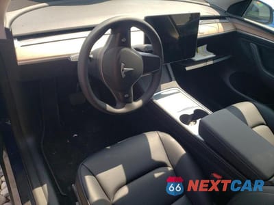 Zdjęcie 8 z 12 samochodu: 2023 TESLA MODEL Y VIN:7SAYGDEE4PF676637 - miniatura