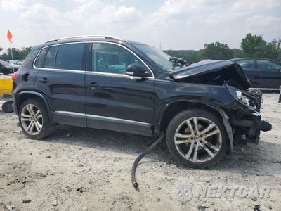 Czwarte zdjęcie samochodu z boku: 2013 VOLKSWAGEN TIGUAN S VIN:WVGBV7AX6DW558254 - miniatura