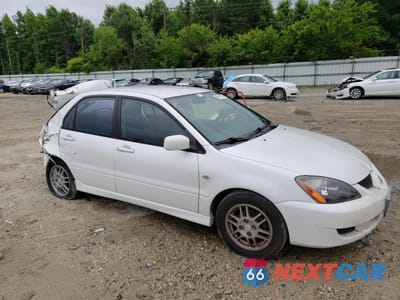 Czwarte zdjęcie samochodu z boku: 2005 MITSUBISHI LANCER OZ RALLY VIN:JA3AJ86E55U008211 - miniatura