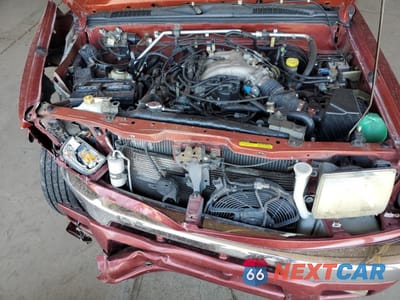 Zdjęcie 11 z 12 samochodu: 2000 NISSAN FRONTIER CREW CAB XE VIN:1N6ED27T8YC429576 - miniatura