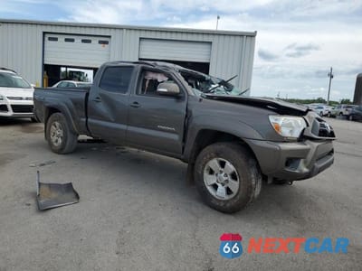 Czwarte zdjęcie samochodu z boku: 2014 TOYOTA TACOMA DOUBLE CAB LONG BED VIN:5TFMU4FN1EX020062 - miniatura