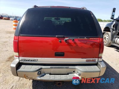 Zdjęcie 6 z 13 samochodu: 1999 GMC JIMMY VIN:1GKDT13W7X2542388 - miniatura