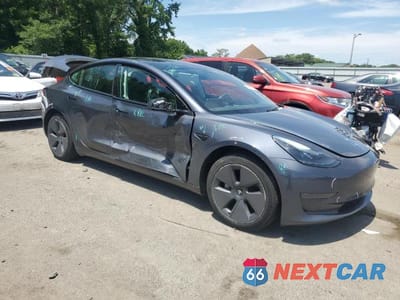 Czwarte zdjęcie samochodu z boku: 2023 TESLA MODEL 3 VIN:5YJ3E1EA9PF397502 - miniatura