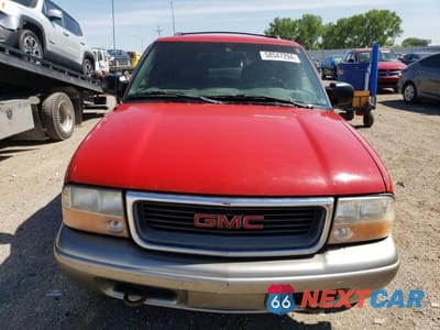 Piąte zdjęcie samochodu w środku: 1999 GMC JIMMY VIN:1GKDT13W7X2542388 - miniatura