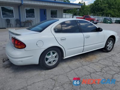 Trzecie zdjęcie samochodu z tyłu: 1999 OLDSMOBILE ALERO GL VIN:1G3NL52E8XC303197 - miniatura