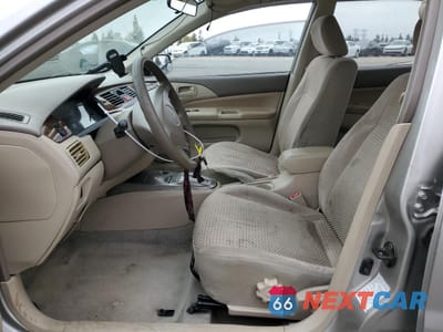 Zdjęcie 7 z 14 samochodu: 2002 MITSUBISHI LANCER LS VIN:JA3AJ36EX2U036410 - miniatura