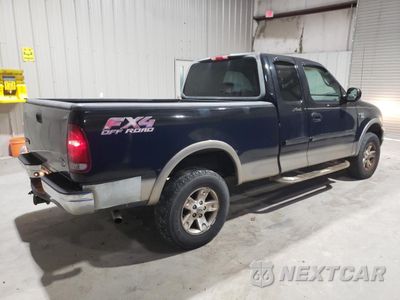 Trzecie zdjęcie samochodu z tyłu: 2002 FORD F150 VIN:1FTRX18L32NA41378 - miniatura