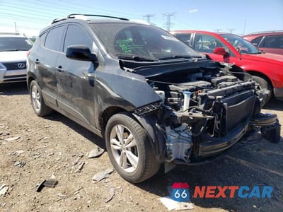 Czwarte zdjęcie samochodu z boku: 2011 HYUNDAI TUCSON GLS VIN:KM8JU3AC0BU229420 - miniatura