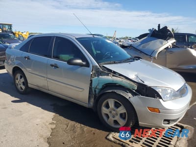 Czwarte zdjęcie samochodu z boku: 2006 FORD FOCUS ZX4 VIN:1FAFP34N26W139281 - miniatura