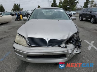 Piąte zdjęcie samochodu w środku: 2002 MITSUBISHI LANCER LS VIN:JA3AJ36EX2U036410 - miniatura