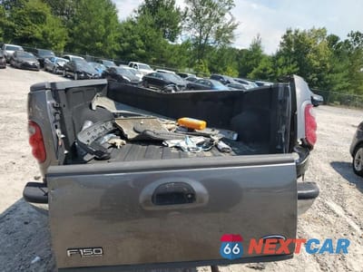 Zdjęcie 6 z 13 samochodu: 2003 FORD F150 SUPERCREW VIN:1FTRW08L83KC94485 - miniatura