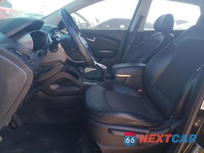 Zdjęcie 7 z 12 samochodu: 2011 HYUNDAI TUCSON GLS VIN:KM8JU3AC0BU229420 - miniatura