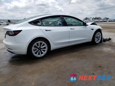 Trzecie zdjęcie samochodu z tyłu: 2022 TESLA MODEL 3 VIN:5YJ3E1EA6NF302844 - miniatura
