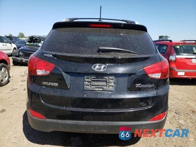 Zdjęcie 6 z 12 samochodu: 2011 HYUNDAI TUCSON GLS VIN:KM8JU3AC0BU229420 - miniatura