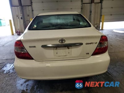 Zdjęcie 6 z 12 samochodu: 2004 TOYOTA CAMRY LE V6 VIN:4T1BF30K74U076383 - miniatura