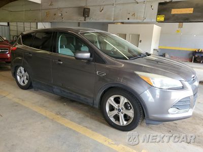 Czwarte zdjęcie samochodu z boku: 2014 FORD ESCAPE SE VIN:1FMCU0GX4EUA81634 - miniatura