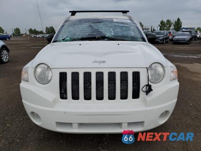 Piąte zdjęcie samochodu w środku: 2010 JEEP COMPASS SPORT VIN:1J4NF4FB7AD547484 - miniatura