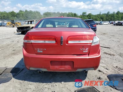 Zdjęcie 6 z 15 samochodu: 2010 LINCOLN MKZ VIN:3LNHL2JC2AR750625 - miniatura