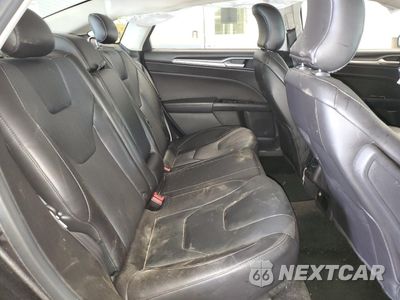 Zdjęcie 11 z 14 samochodu: 2016 FORD FUSION TITANIUM PHEV VIN:3FA6P0SU4GR288286 - miniatura