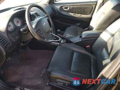 Zdjęcie 7 z 12 samochodu: 2002 NISSAN MAXIMA GLE VIN:JN1DA31A32T309957 - miniatura