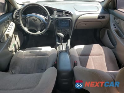 Zdjęcie 8 z 14 samochodu: 1999 OLDSMOBILE ALERO GL VIN:1G3NL52E8XC303197 - miniatura