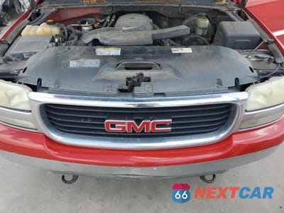 Zdjęcie 12 z 13 samochodu: 2001 GMC YUKON XL C1500 VIN:1GKEC16T41J238048 - miniatura