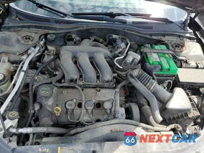 Zdjęcie 12 z 15 samochodu: 2006 MERCURY MILAN PREMIER VIN:3MEHM08166R606088 - miniatura