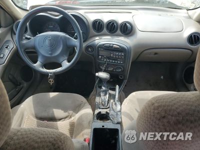 Zdjęcie 8 z 12 samochodu: 2004 PONTIAC GRAND AM SE VIN:1G2NE52F54M576577 - miniatura
