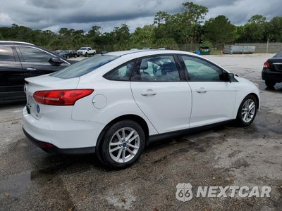 Trzecie zdjęcie samochodu z tyłu: 2018 FORD FOCUS SE VIN:1FADP3F21JL202004 - miniatura