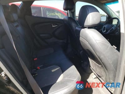 Zdjęcie 10 z 12 samochodu: 2011 HYUNDAI TUCSON GLS VIN:KM8JU3AC0BU229420 - miniatura