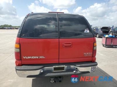 Zdjęcie 6 z 13 samochodu: 2001 GMC YUKON XL C1500 VIN:1GKEC16T41J238048 - miniatura
