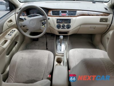 Zdjęcie 8 z 14 samochodu: 2002 MITSUBISHI LANCER LS VIN:JA3AJ36EX2U036410 - miniatura