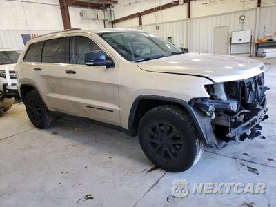 Czwarte zdjęcie samochodu z boku: 2014 JEEP GRAND CHEROKEE LIMITED VIN:1C4RJFBG3EC419029 - miniatura