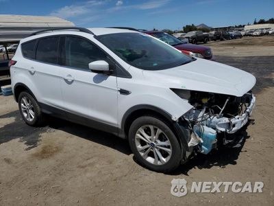 Czwarte zdjęcie samochodu z boku: 2018 FORD ESCAPE SE VIN:1FMCU0GDXJUC11397 - miniatura